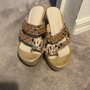 Pretty gold sandalsWorn only a couple of times. 31/2 inch wedge
